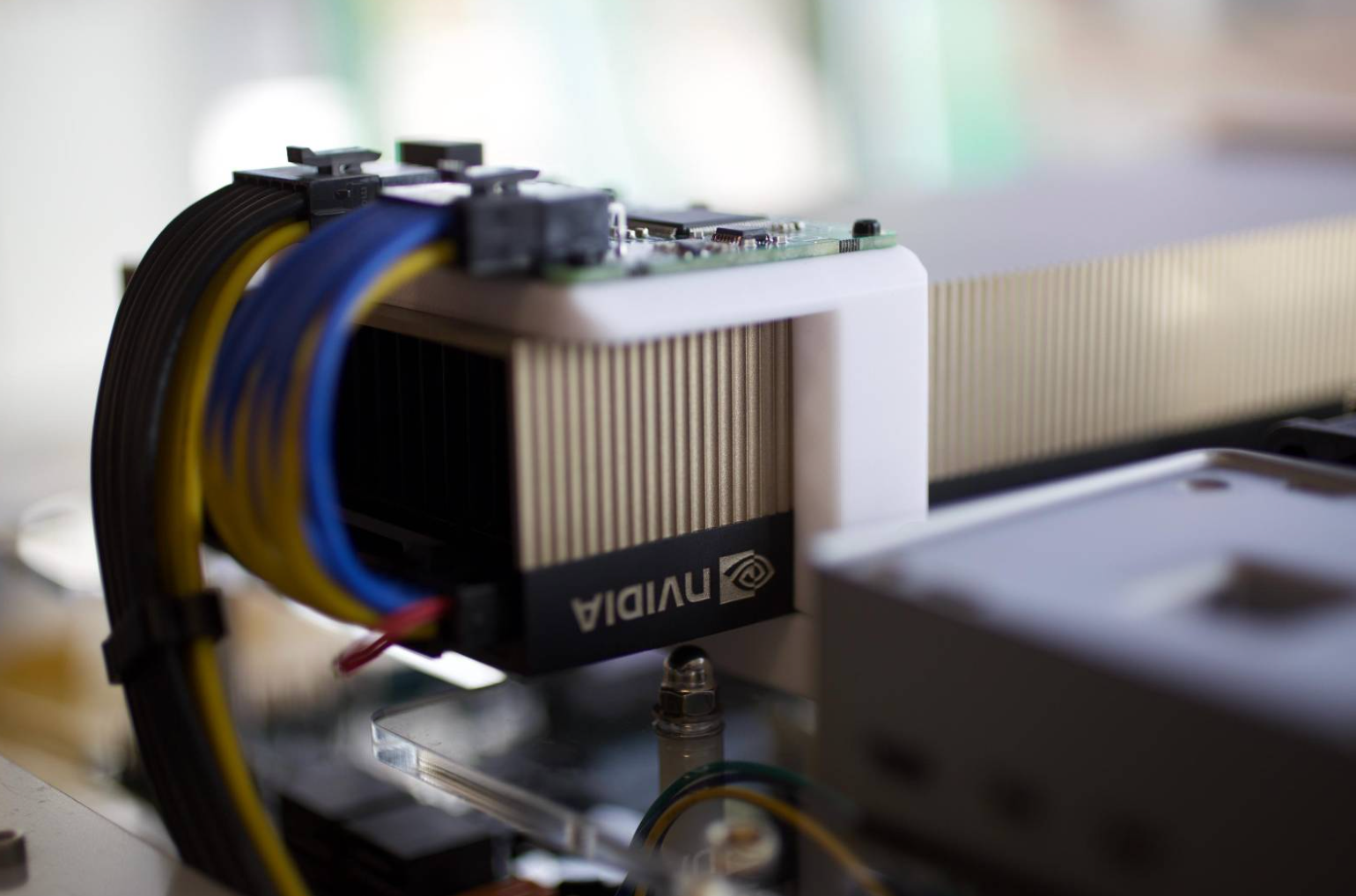 A BlueField DPU installed in the test rig, with fibre cables connected