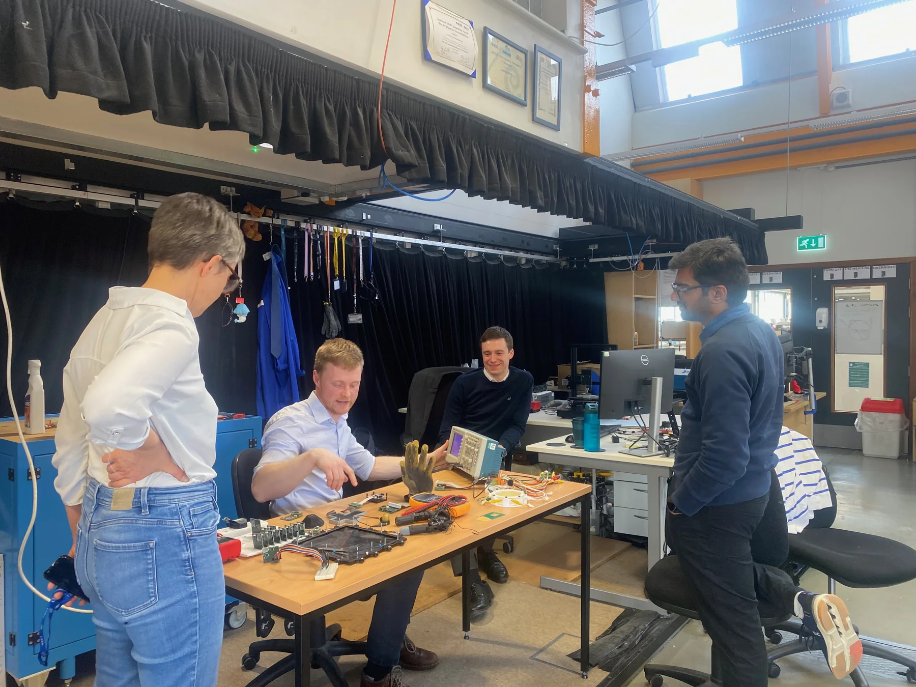 Toby debugging the EIT team’s hardware in Cambridge.